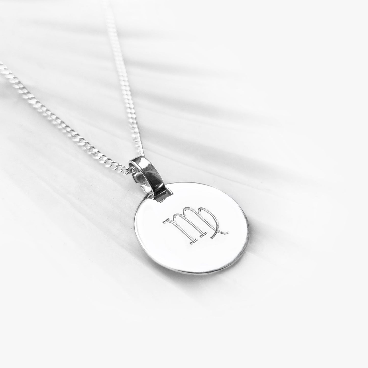 Silberkette mit rundem Anhänger  mit Sternzeichen